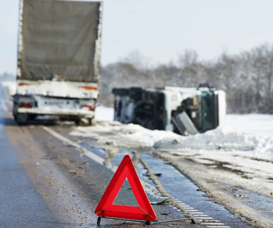 Tow truck recovering an overturned vehicle in Calgary