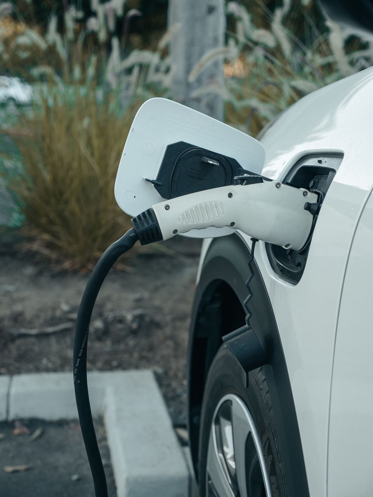 Electric vehicle plugged in and charging in Calgary