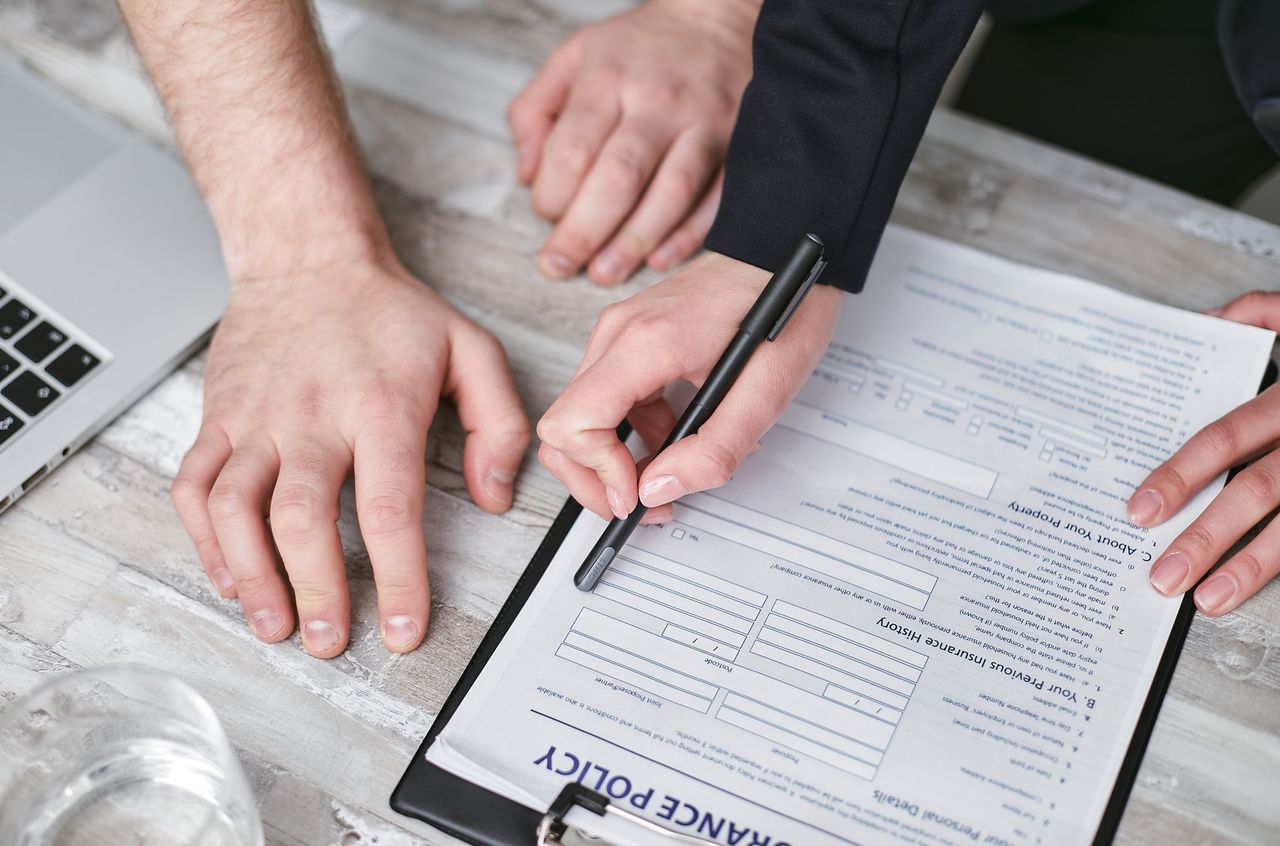 Signing an insurance policy for towing claim in Calgary