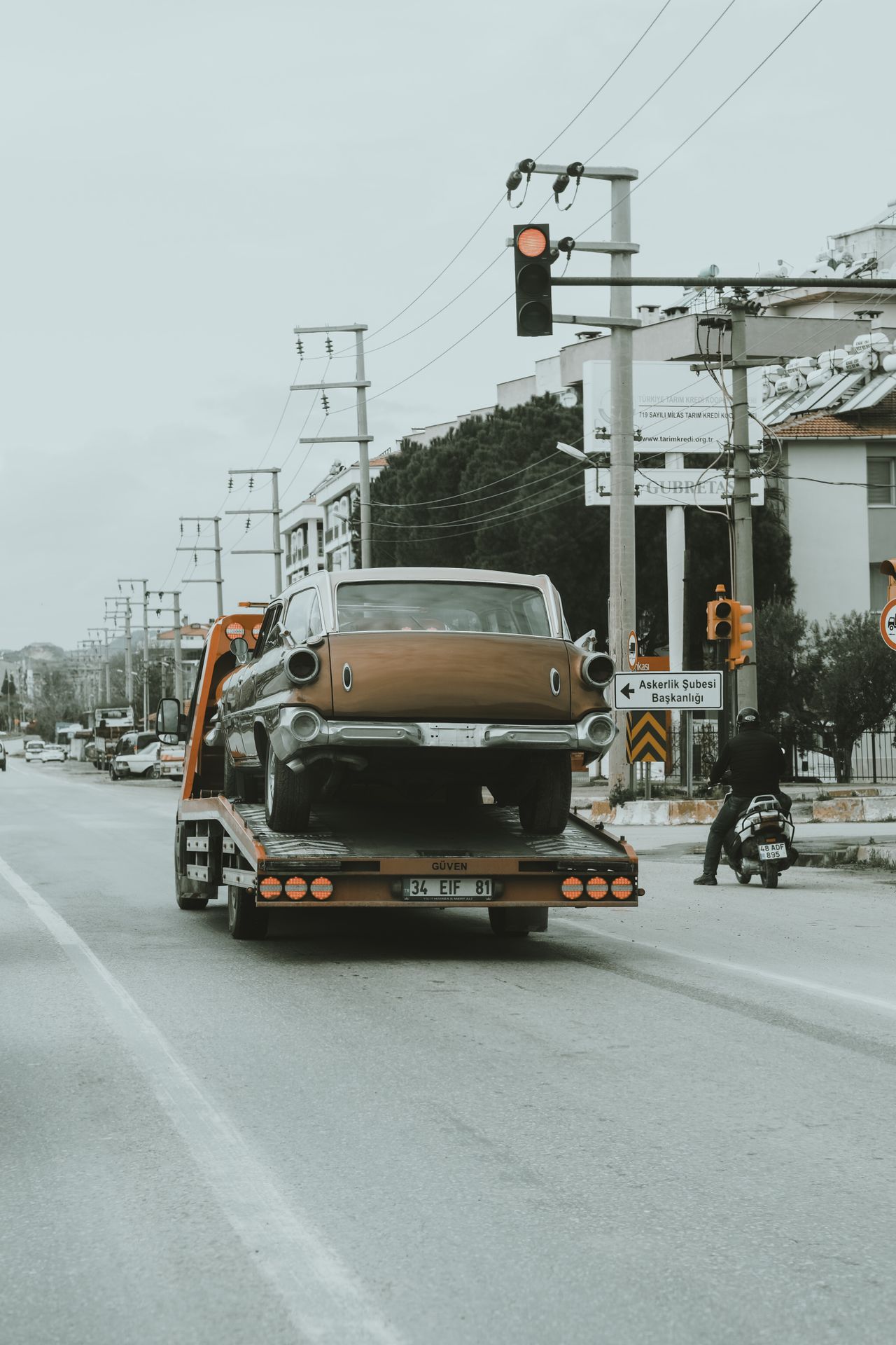 Long-distance tow truck transporting a car near Calgary